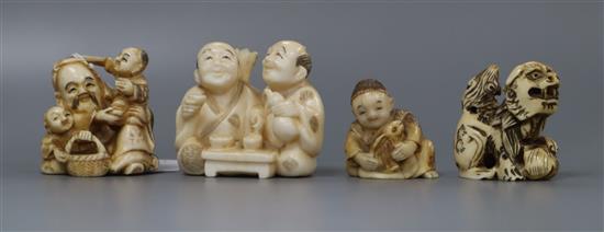 Four Japanese ivory netsuke, early 20th century, depicting figures and a shi-shi 3.2cm - 4.7cm